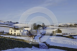 Farm in snowy countryside