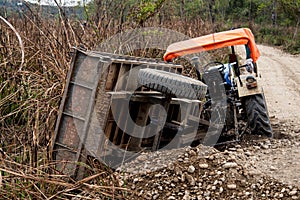 Farm tracktor accident on the side of a rural road