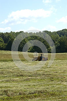 Farm Tractor Making Hay