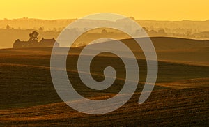 The farm on undulating fields of autumn