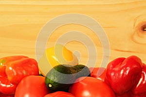 Farm vegetables closeup with plank background for design