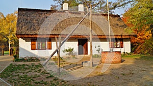 Farm, white wooden buildings of the area of the museum