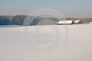 Farm in winter in Masuria. Poland.