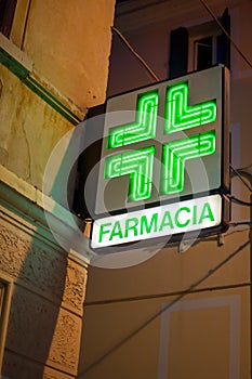 Farmacia Pharmacy green cross neon sign medicine medical Italia Italy photo