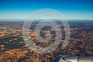 Farmed fields aerial view from airplane near Madrid, Spain