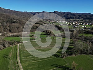 farmed fields of Borghetto di Borbera Piedmont Italy Village aerial View Panorama landscape