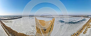 Farmed fish ponds in winter from a bird`s eye view in Silesia, Poland