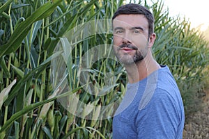 Farmer in beautiful corn fields