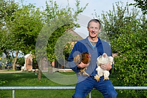 Farmer with chickens