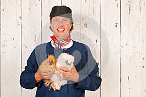 Farmer with chickens