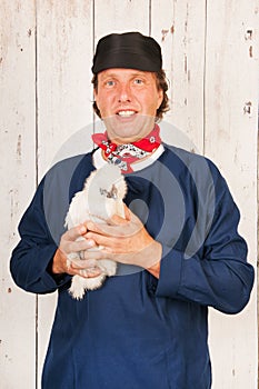 Farmer with chickens