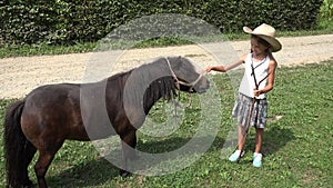 Farmer Child Looking a Grazing Pony Horse, Cowboy Girl Playing, Pasturing 4K