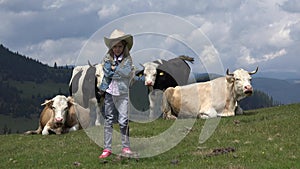 Farmer Child Pasturing Cows, Cowherd Girl with Cattle on Meadow in Mountains 4K