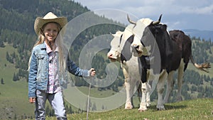 Farmer Child Pasturing Cows, Cowherd Kid with Cattle on Meadow Girl in Mountains