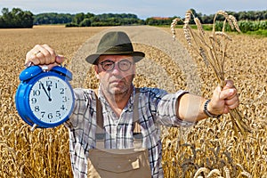 Farmer with Clock 11:55 photo