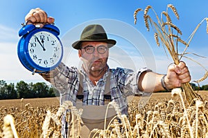 Farmer with Clock 11:55 photo