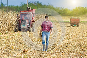 Farmer on corn harvest photo