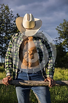 farmer or cowboy with unbuttoned shirt