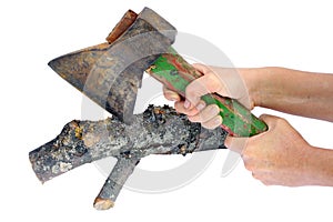 The farmer cuts with a rusty axe a log