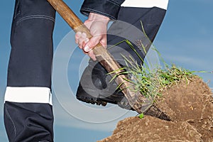 Farmer digging a garden