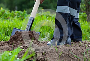 Farmer digging a garden