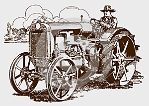 Farmer driving a antique tractor in a field, in three-quarter view