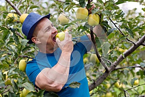 Farmer eating an apple
