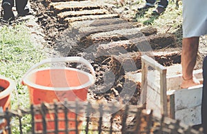 Farmer growing straw mushroom on rice straw