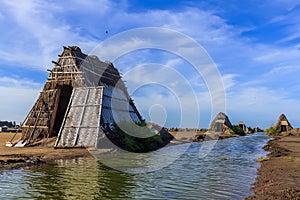 Farmer harvesting salt in salt fields