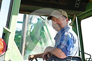 Farmer in his Tractor photo