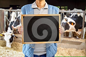 Cattle rancher showing the blackboard