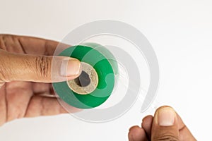 Farmer holding a graft film in hand on white isolated background