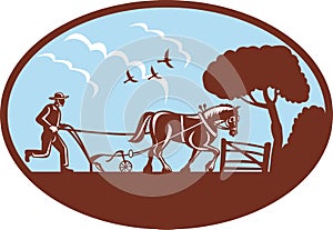 Farmer and horse plowing field