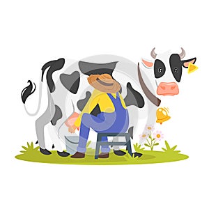 Farmer milking a cow