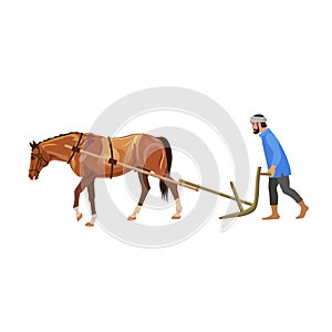 Farmer plowing field with horse