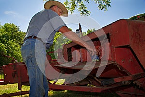 Farmer Preps His Hay Baler