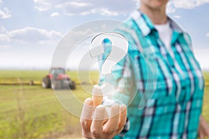 Farmer shows a question mark .