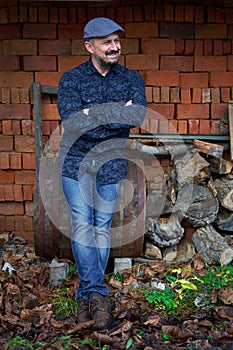 Farmer sitting on a wine cask