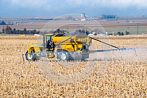 Farmer Spraying Fertilizer