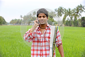 Farmer talking in his cell phone