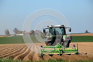 Farmer Tilling Field