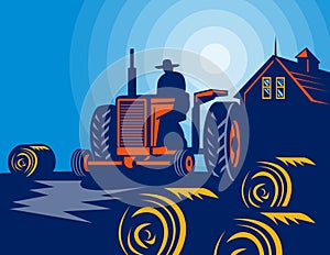 Farmer tractor hay bales barn