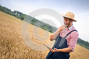 Farmer using digital tablet