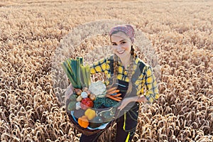 Farmer woman offering healthy vegetables