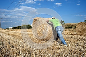 Farmer working at his farmland photo