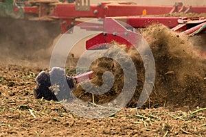 A farmer working with a Horsch Pronto 4dc seeding drill