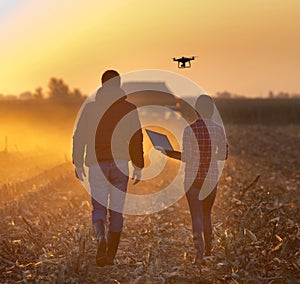 Farmers with drone img