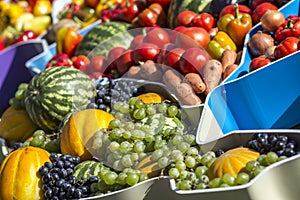 Farmers fruit market with various colorful fresh fruits and vegetables