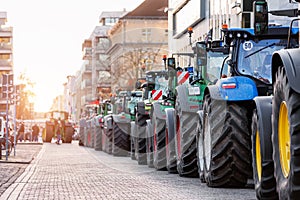 Farmers union protest strike against government Policy in Germany Europe. Tractors vehicles blocks city road traffic
