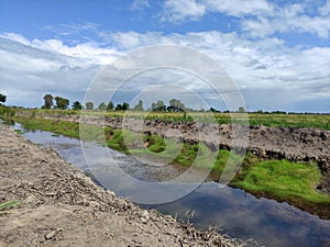 Farmers& x27; waterways. Beautiful clouds during the day